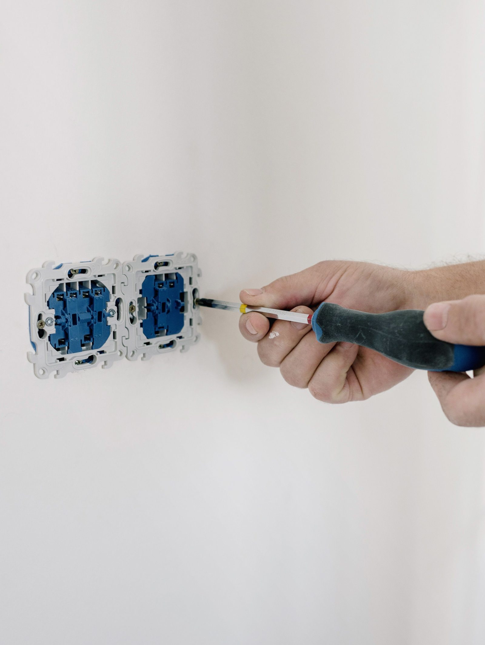 Ro&Yu Electric Company electrician working on a residential panel